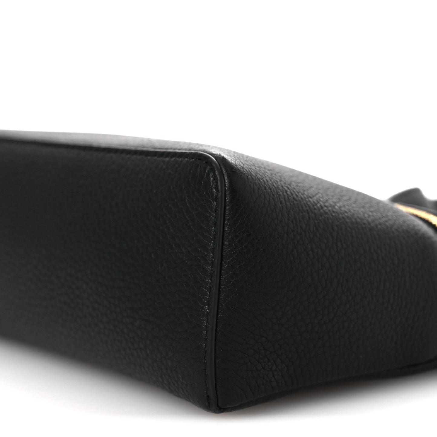Black grained leather pouch base edge with reinforced corner stitching