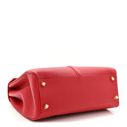 Red leather tote bag base with gold stud feet and rolled corner seams