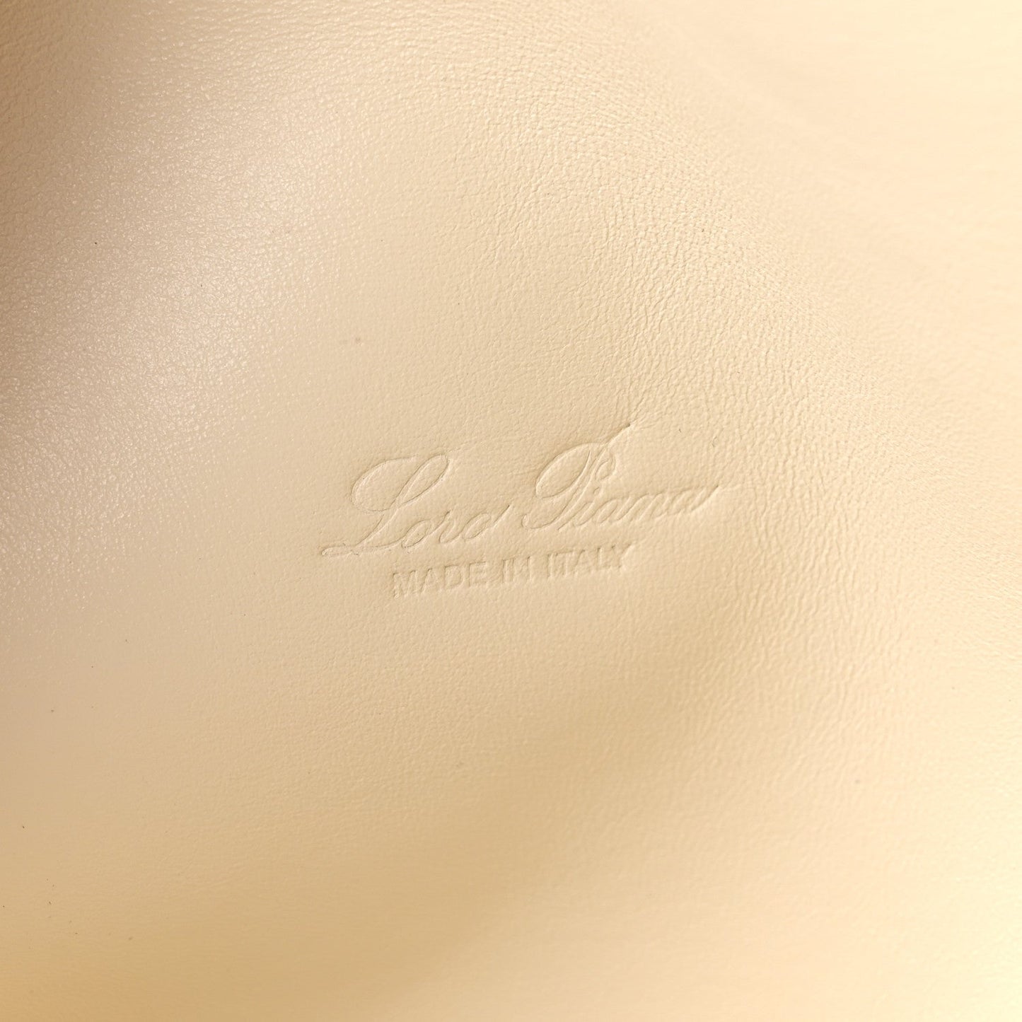 White lambskin bag with embossed Loro Piana logo