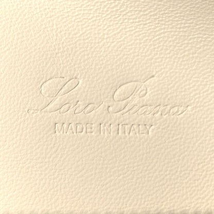 Embossed leather logo text and 'MADE IN ITALY' on grained calfskin