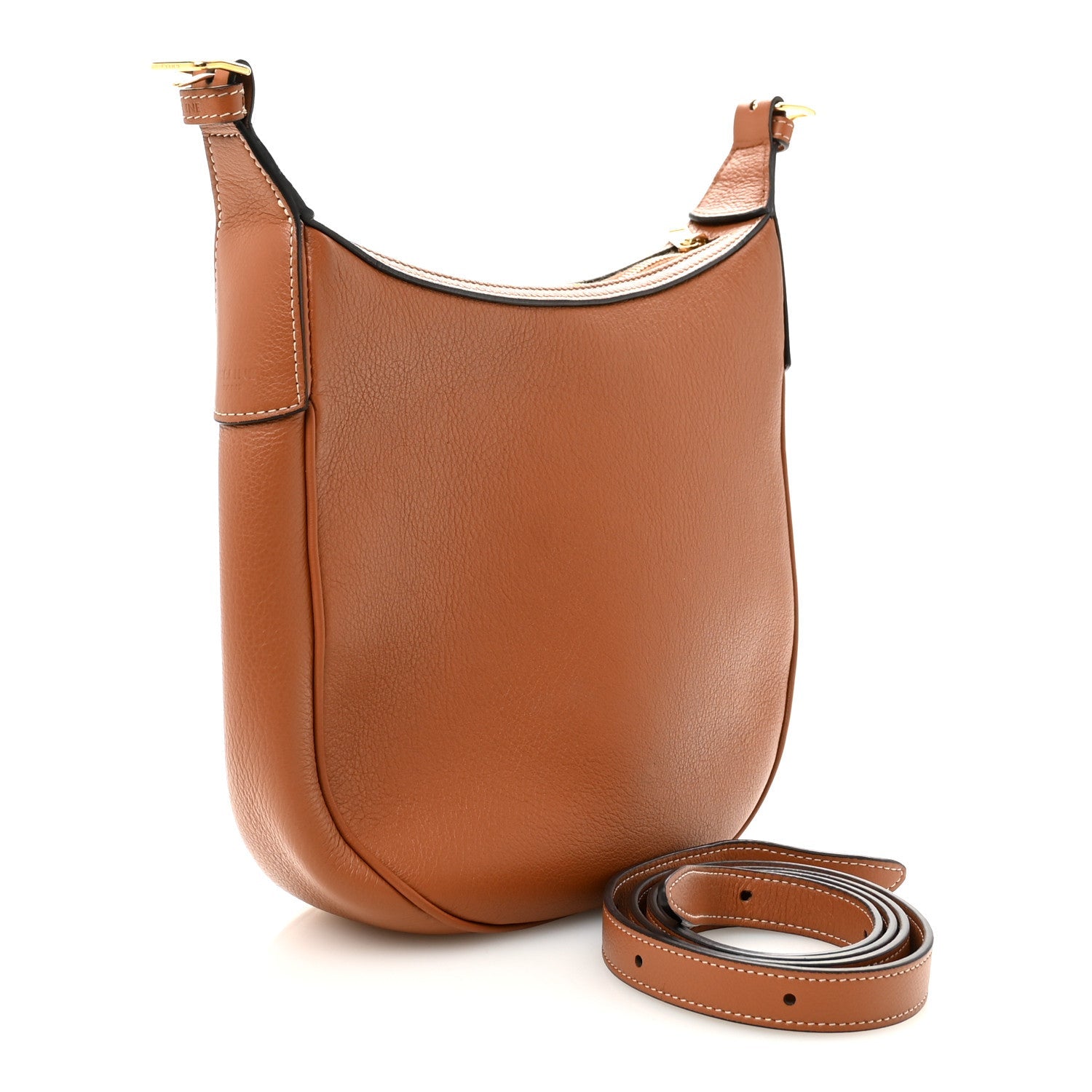Tan leather hobo shoulder bag with embossed front detail and included shoulder strap