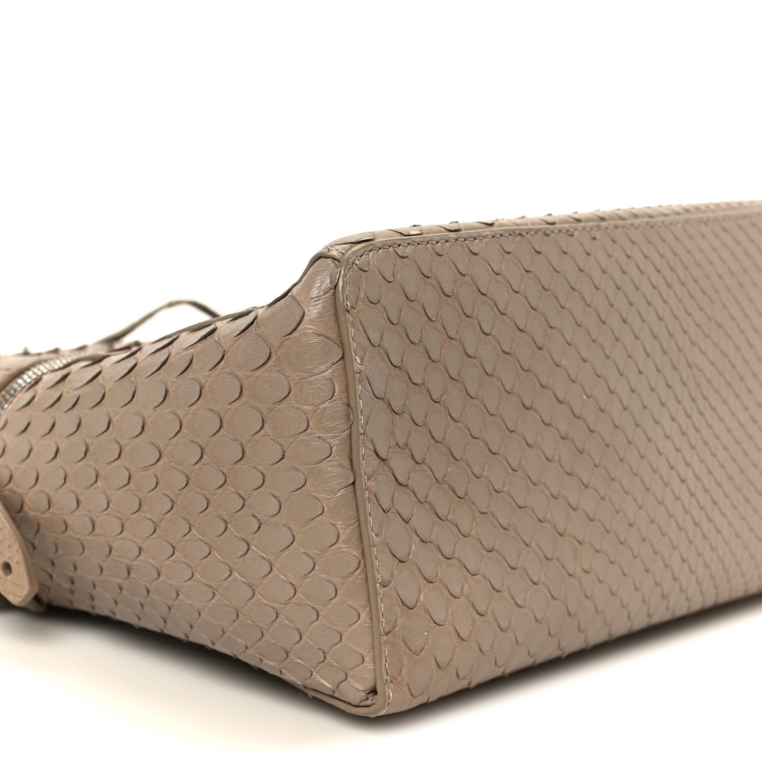 Matte snakeskin handbag close-up of side panel with structured body, taupe/grey tone