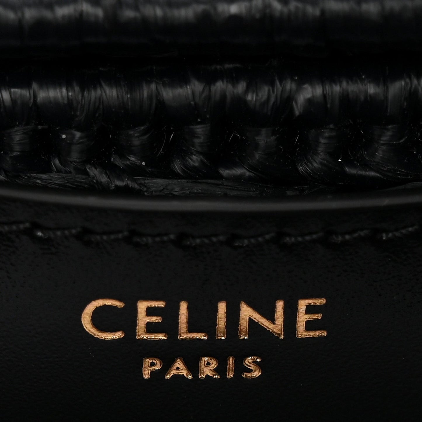 Gold CELINE PARIS CC lettering on black flap