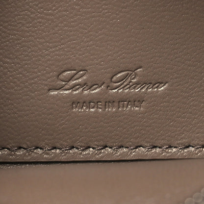 Embossed Loro Piana logo on grained leather with “MADE IN ITALY”
