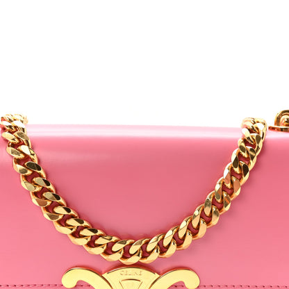 Flamingo pink leather bag front with gold Triomphe emblem and chain