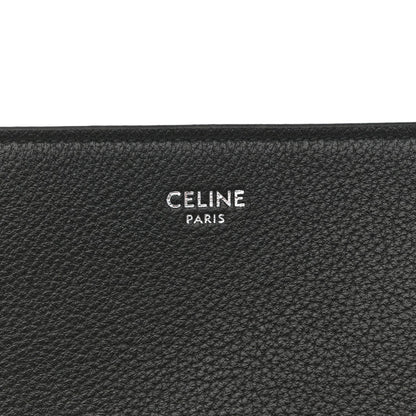 Black leather bag interior panel with CELINE PARIS embossed logo