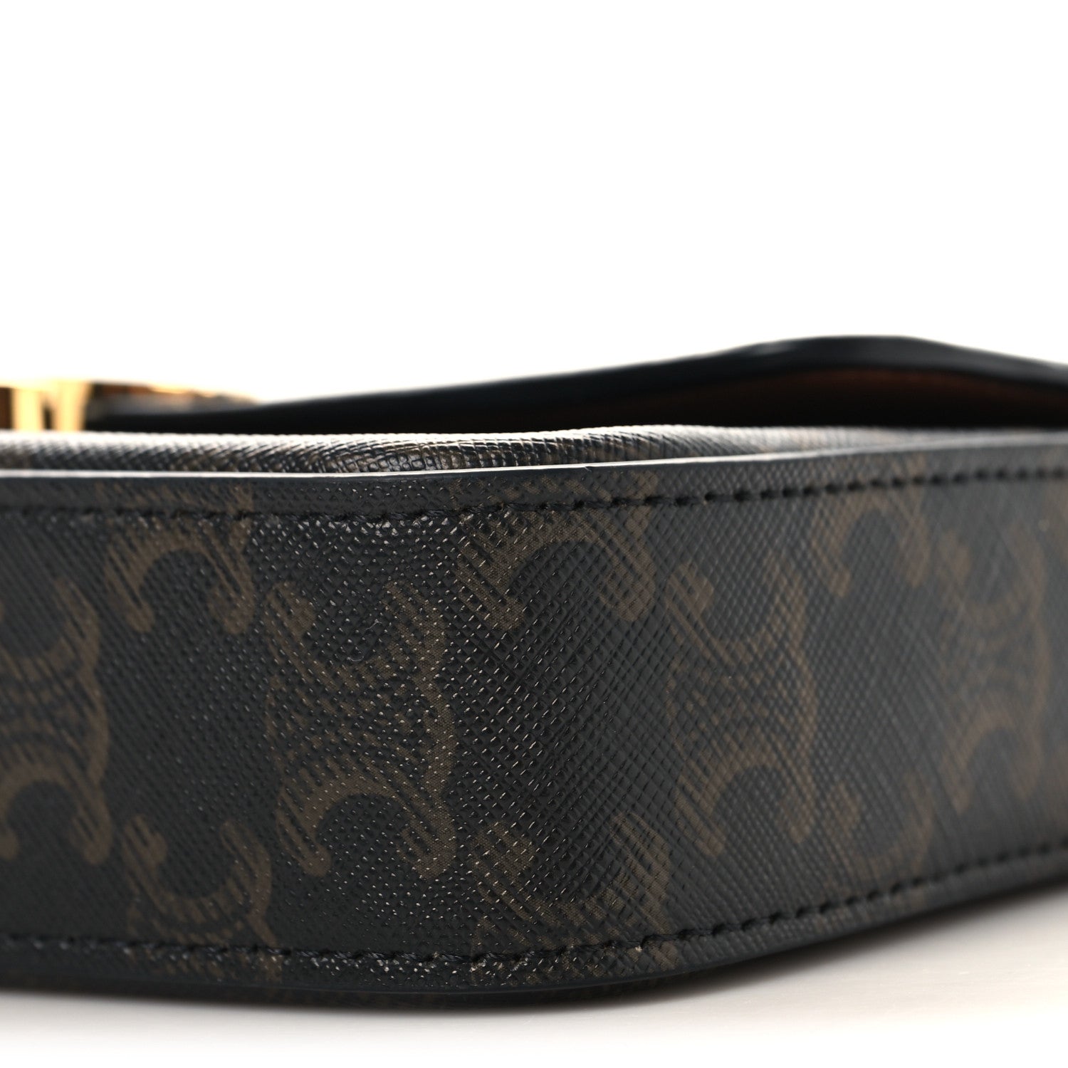 Celine Triomphe canvas bag edge with dark monogram texture and stitched seam
