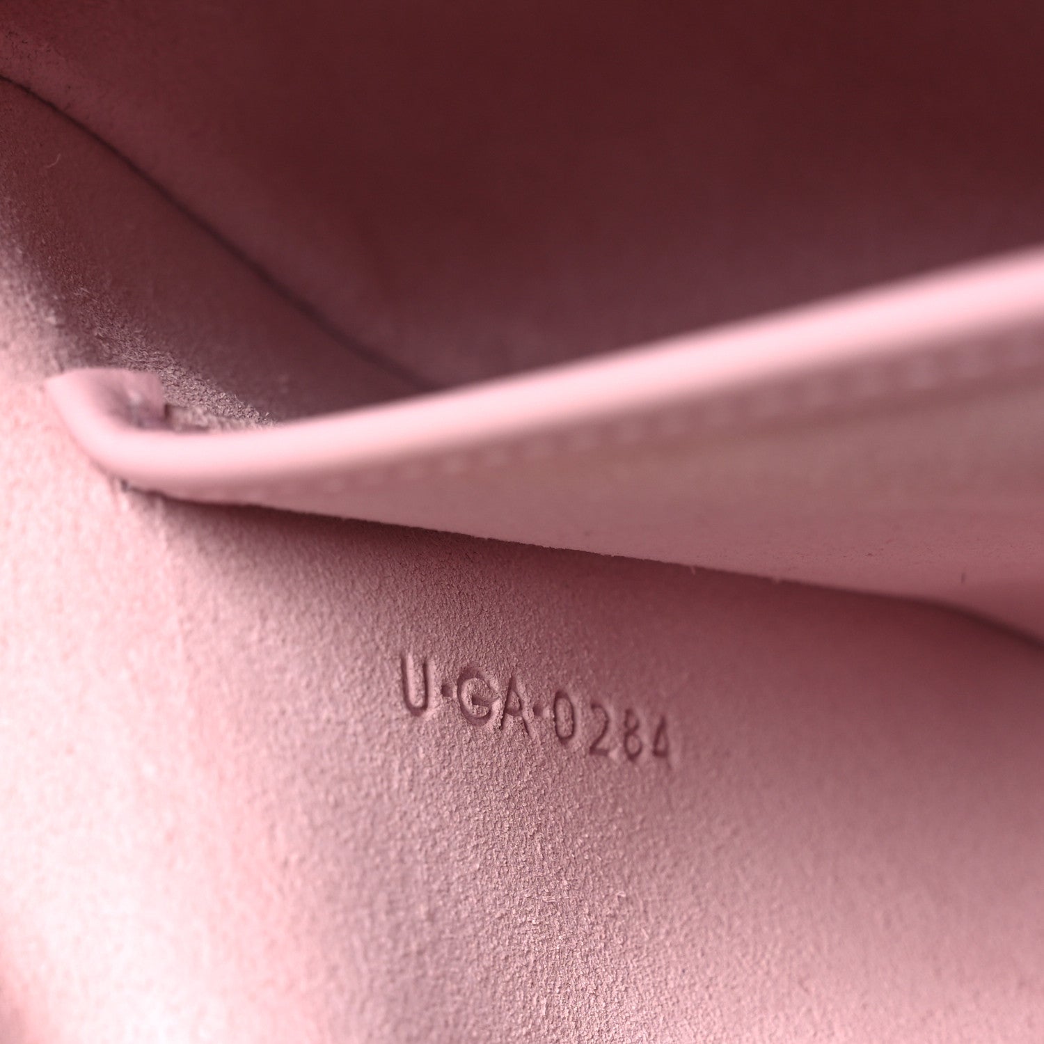 Celine smooth calfskin interior stamp “U-GA10284” on pastel pink lining