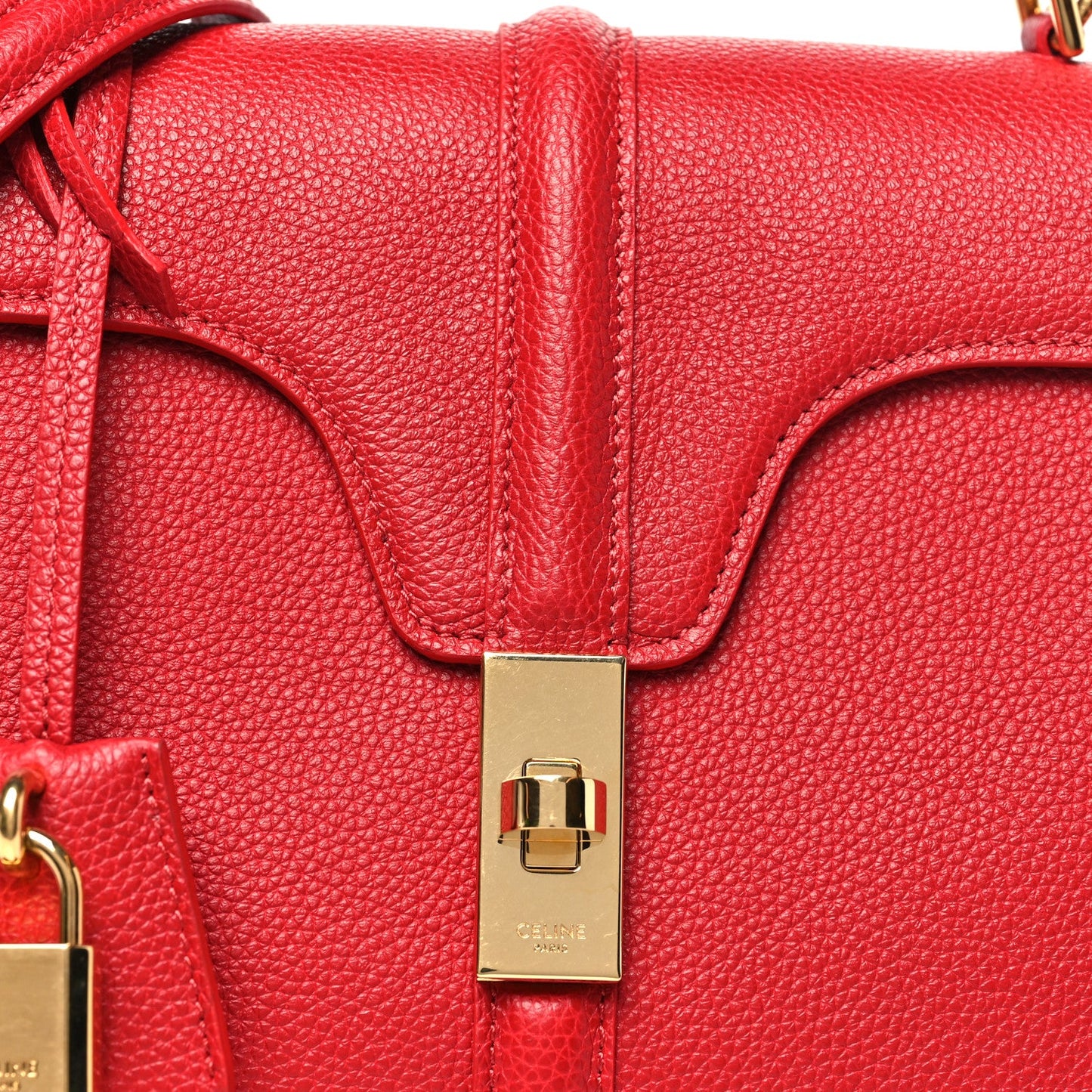 Celine red grained calfskin bag front with gold lock on flap.