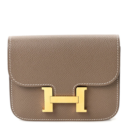 Front flap Hermes Constance slim wallet, etoupe textured leather, gold H clasp