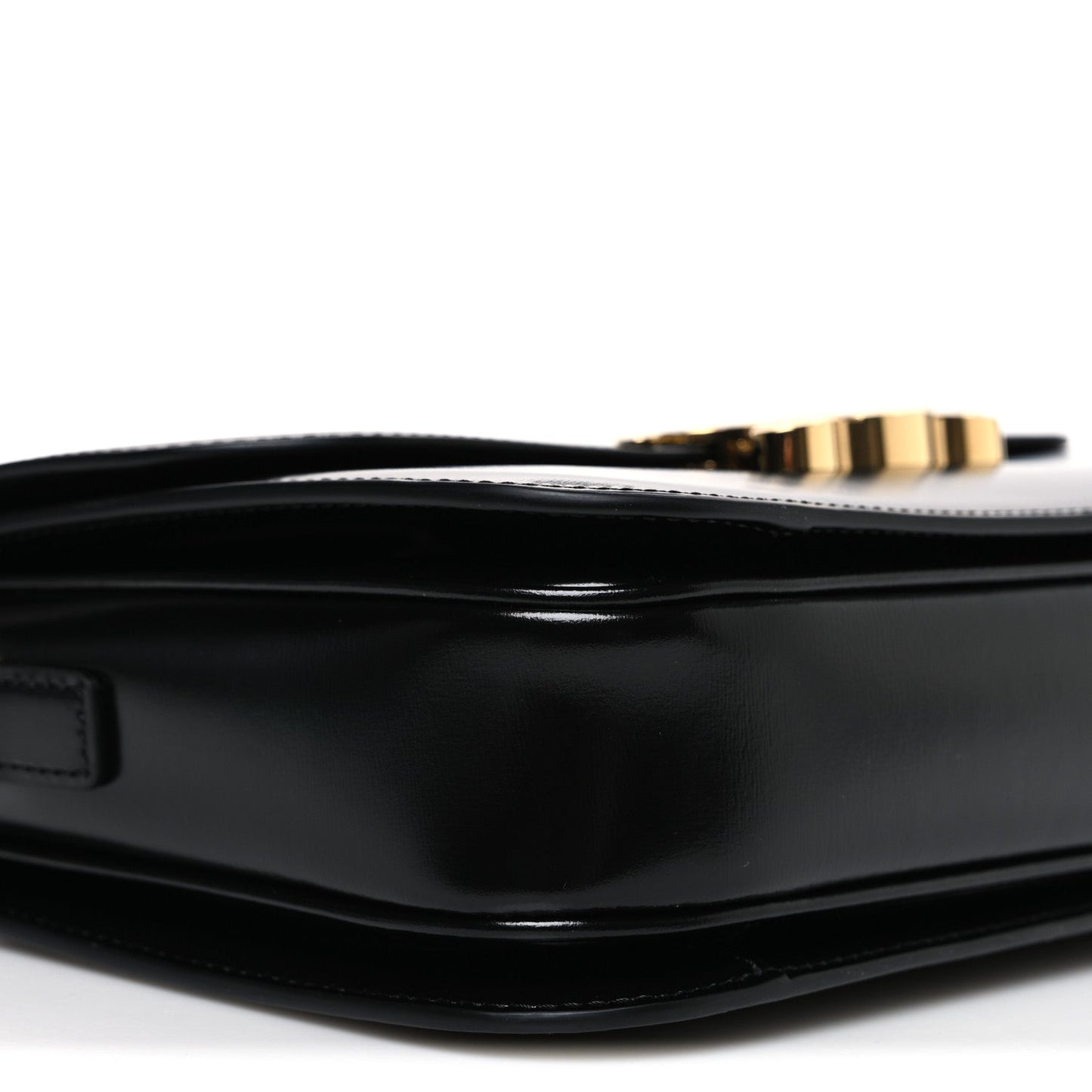 Shiny calfskin medium shoulder bag top interior close-up with gold zipper pull