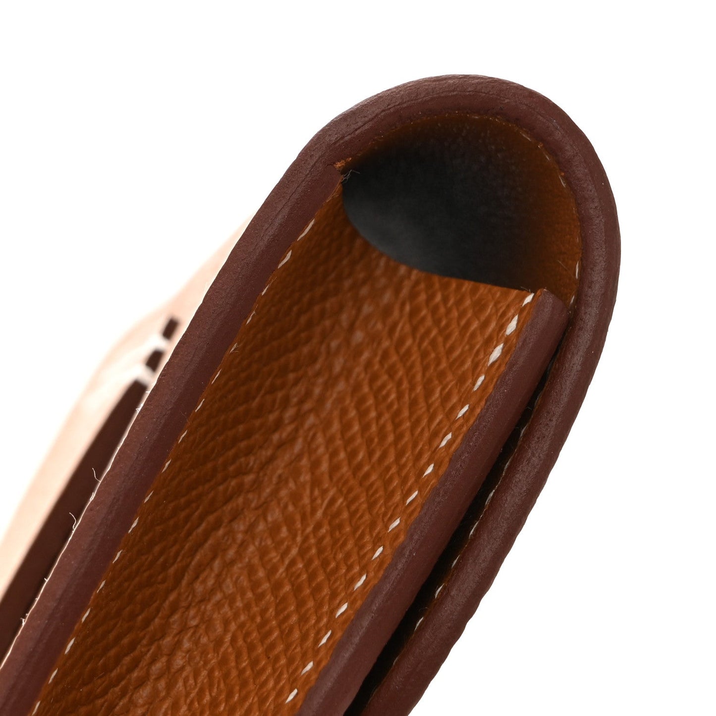 Brown slim wallet interior with open top showing leather card slot.