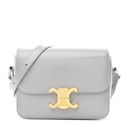 Shiny calfskin shoulder bag with flap and gold-tone front logo clasp