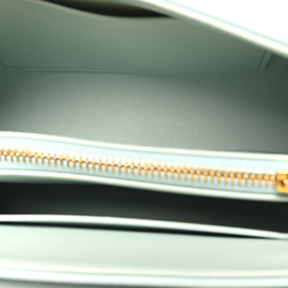 Leather lining with gold zipper track and pull tab