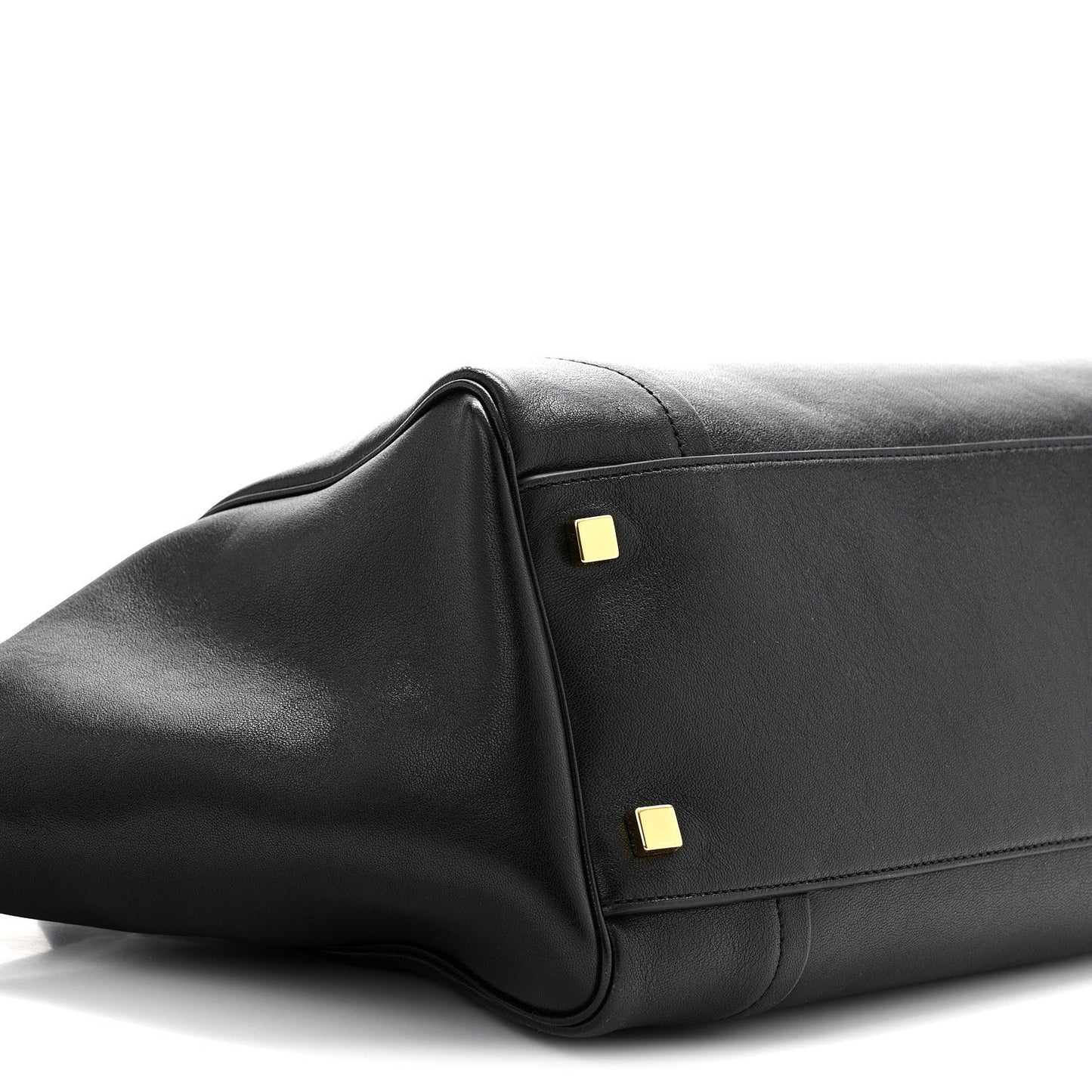 Celine black leather tote corner detail with two gold hardware studs
