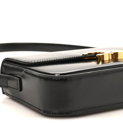 Black shiny calfskin shoulder bag corner with zipper and gold-tone hardware