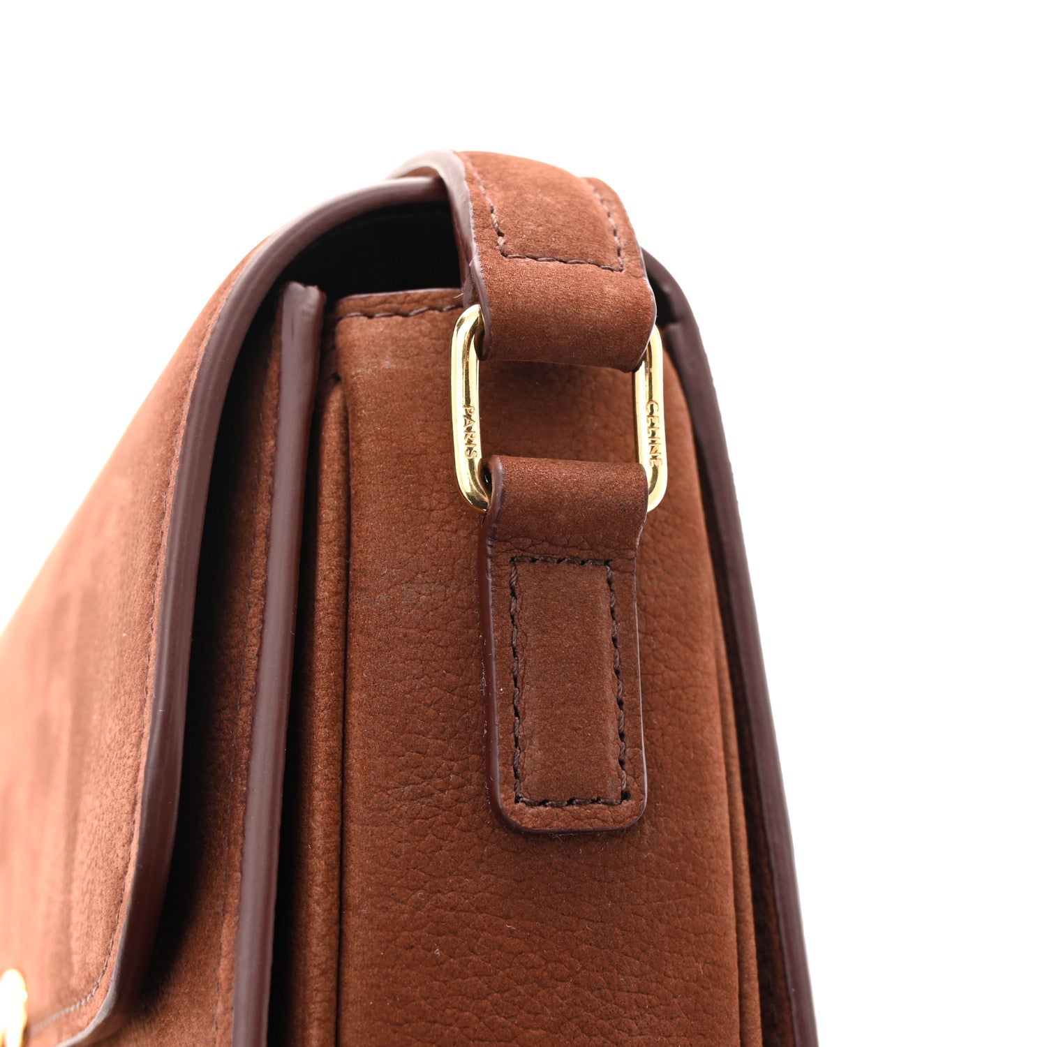 Chestnut nubuck shoulder bag with top handle and brass buckle on flap