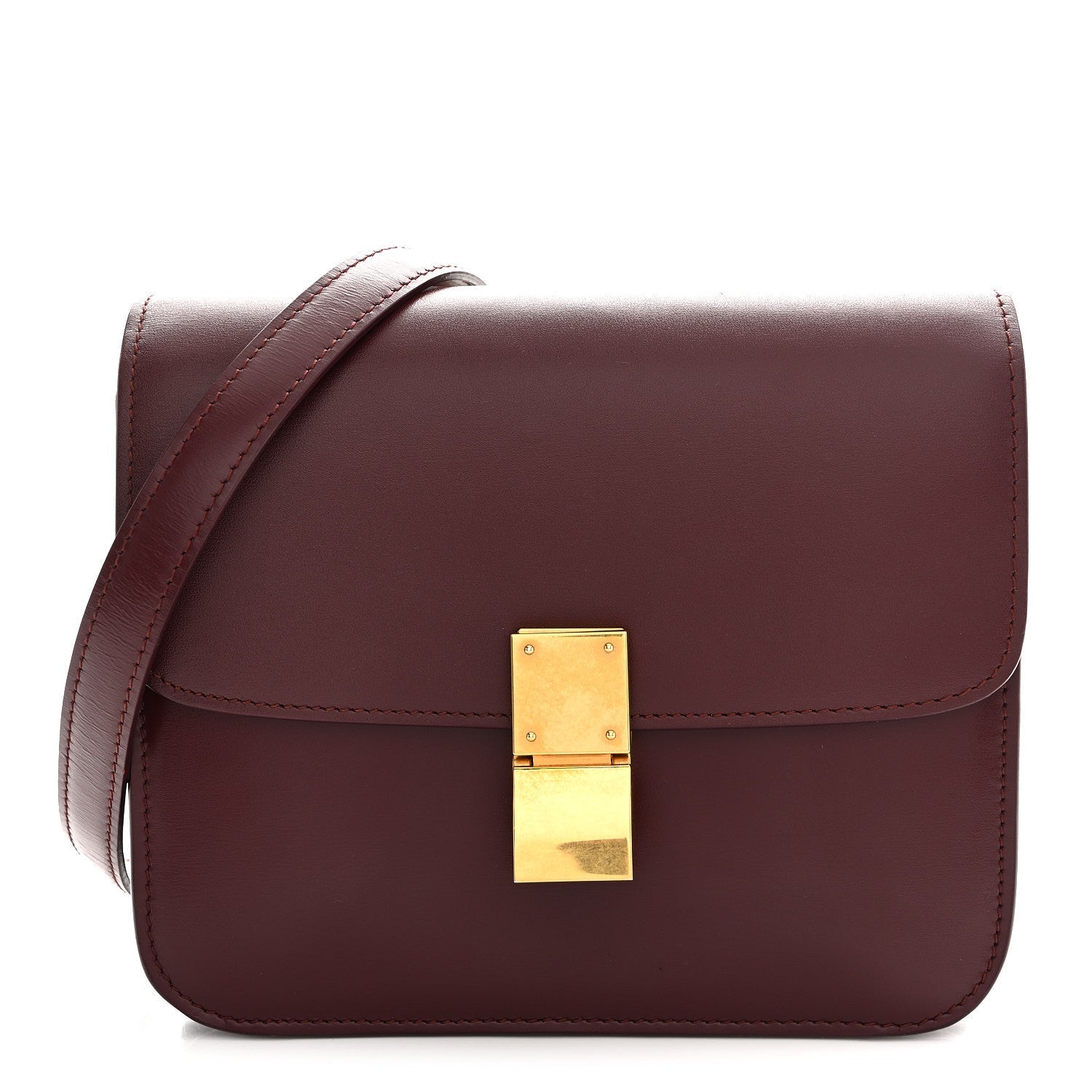 Burgundy leather box flap bag with gold-tone front clasp and structured front flap.