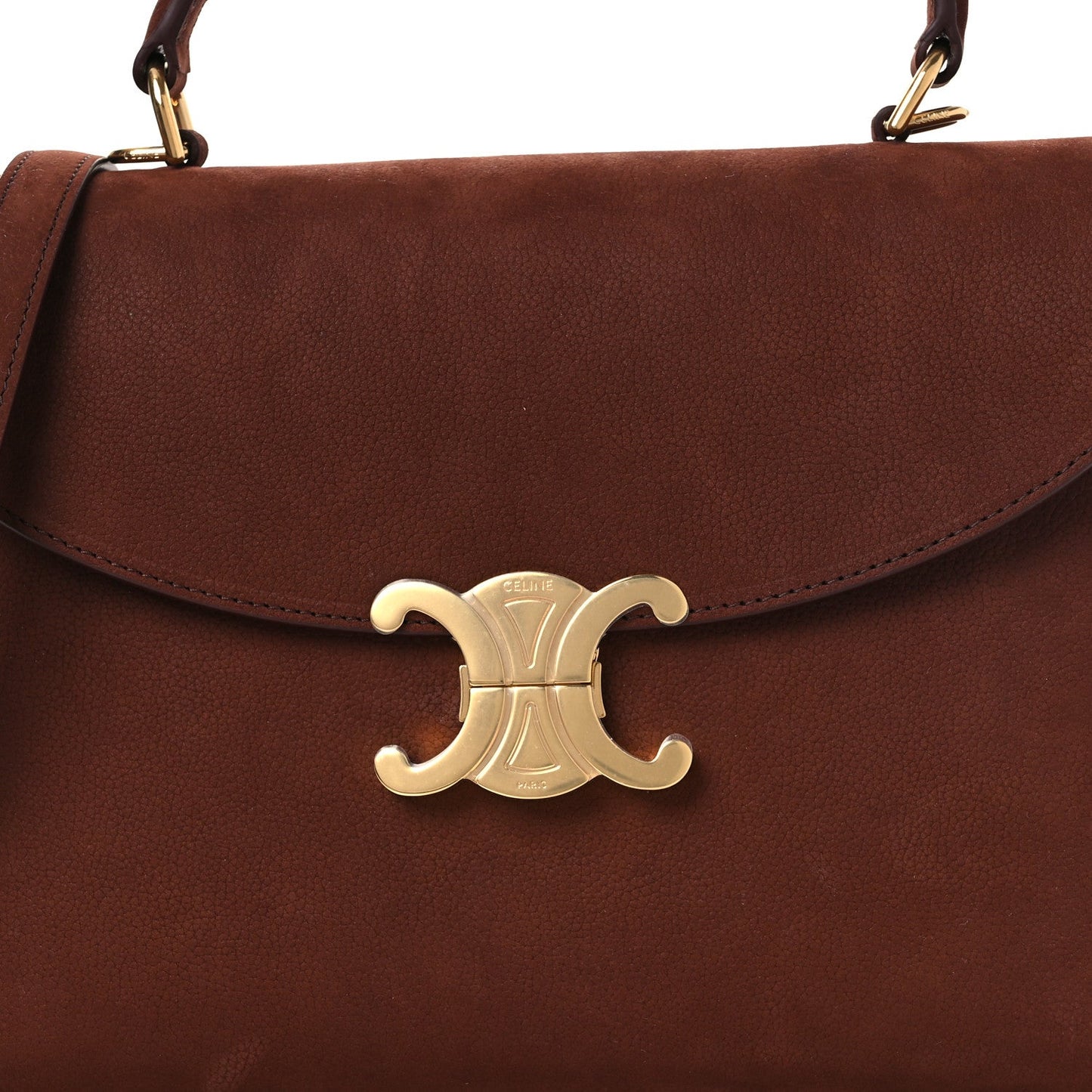 Chestnut flap bag with gold Celine logo clasp and top handles.