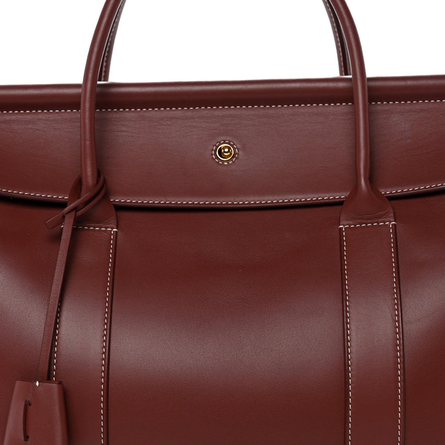 Loro Piana calfskin bag front with center snap and hanging leather key holder