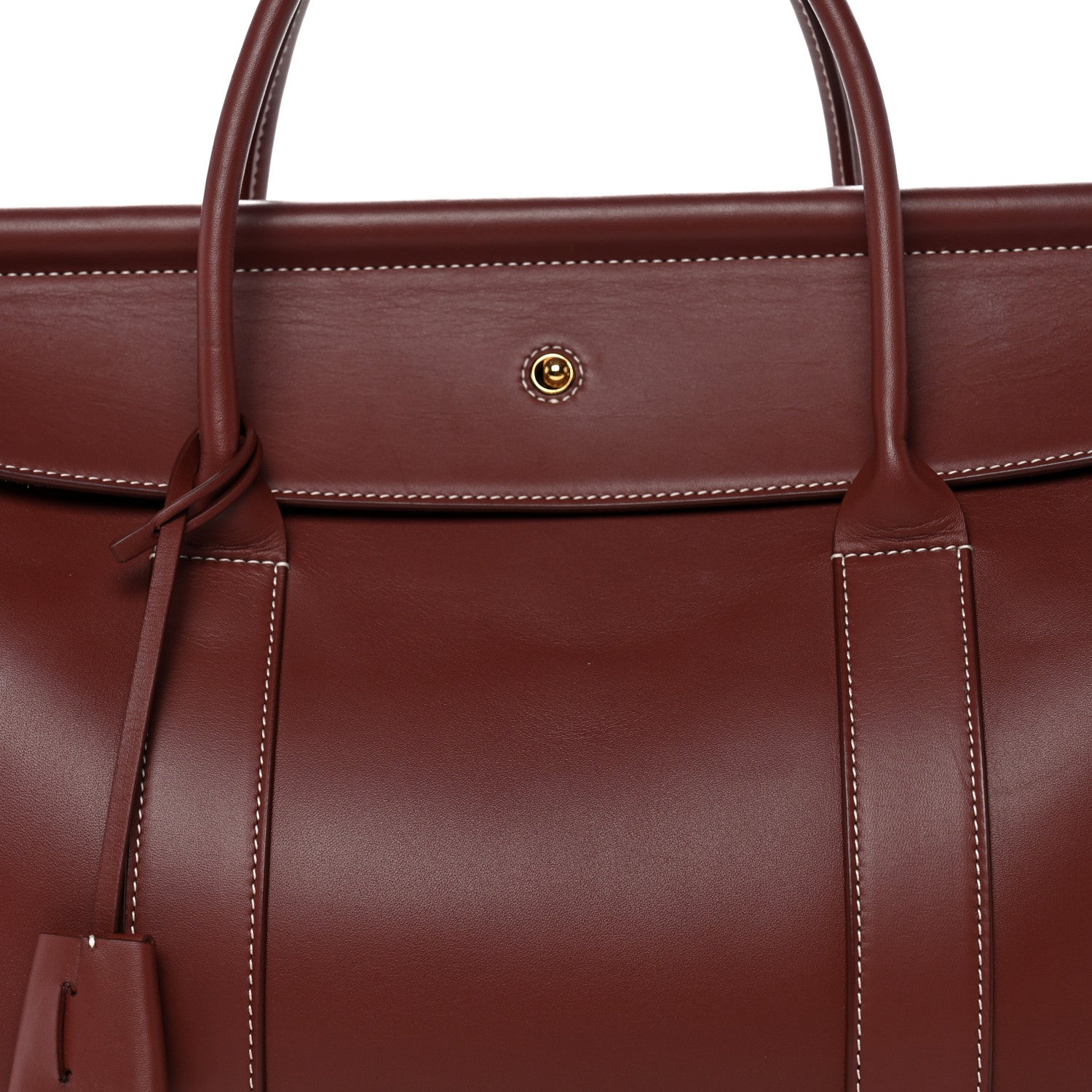 Loro Piana calfskin bag front with center snap and hanging leather key holder