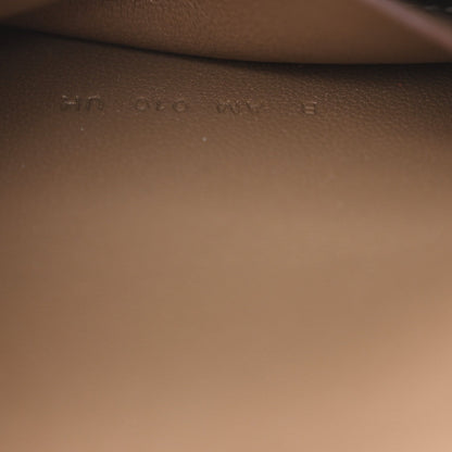 Taupe leather interior with faint embossed marks