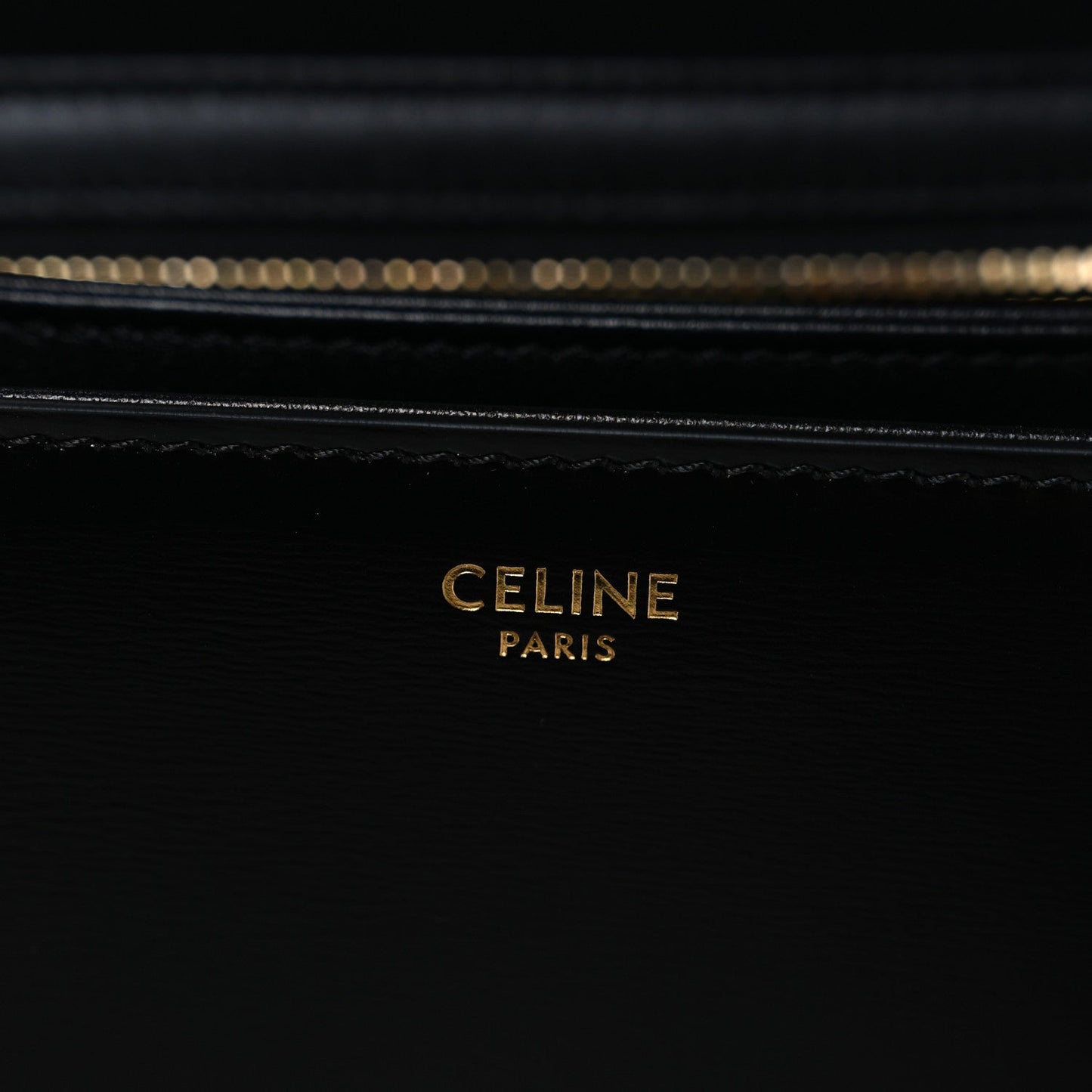 Shiny calfskin medium shoulder bag interior with gold “CELINE PARIS” branding