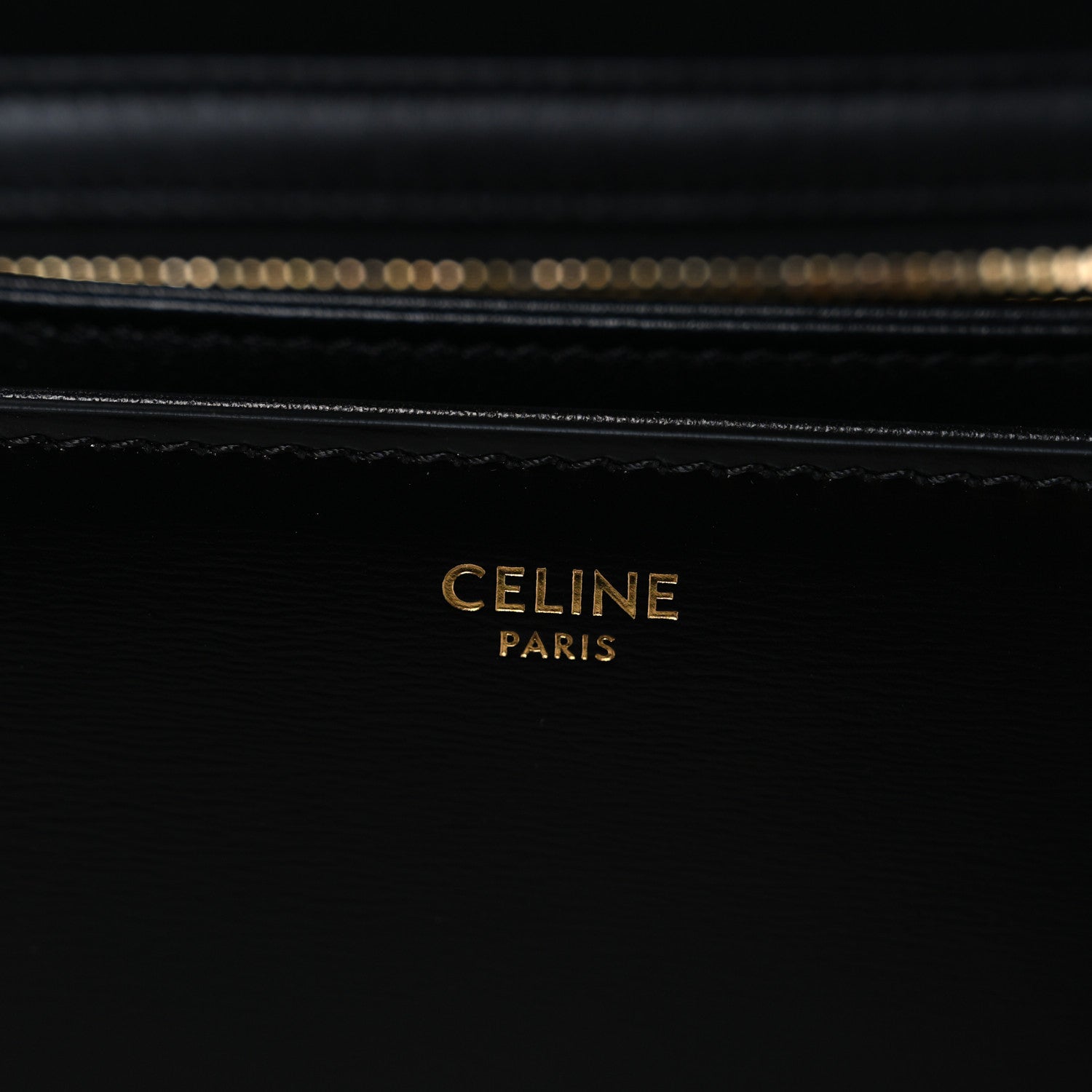 Shiny calfskin medium shoulder bag interior with gold “CELINE PARIS” branding