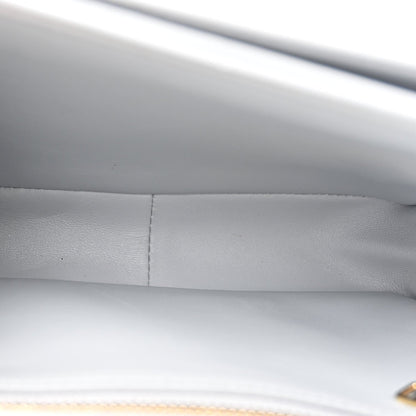 Shiny calfskin bag interior seam and lining close-up