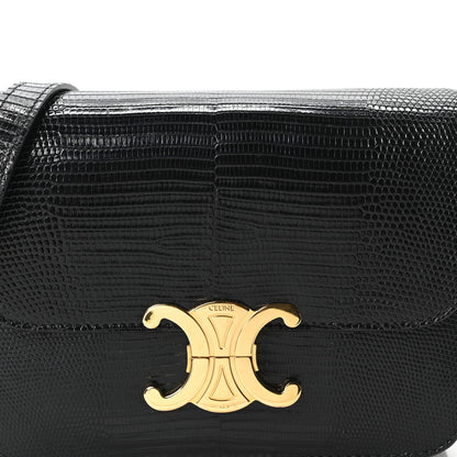 Black lizard-embossed flap bag with centered gold C clasp