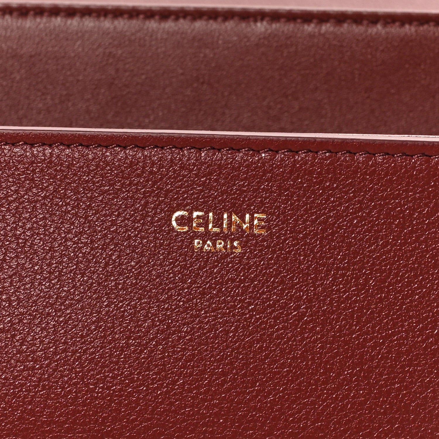 Celine Paris stamped logo on burgundy grained calfskin bag panel