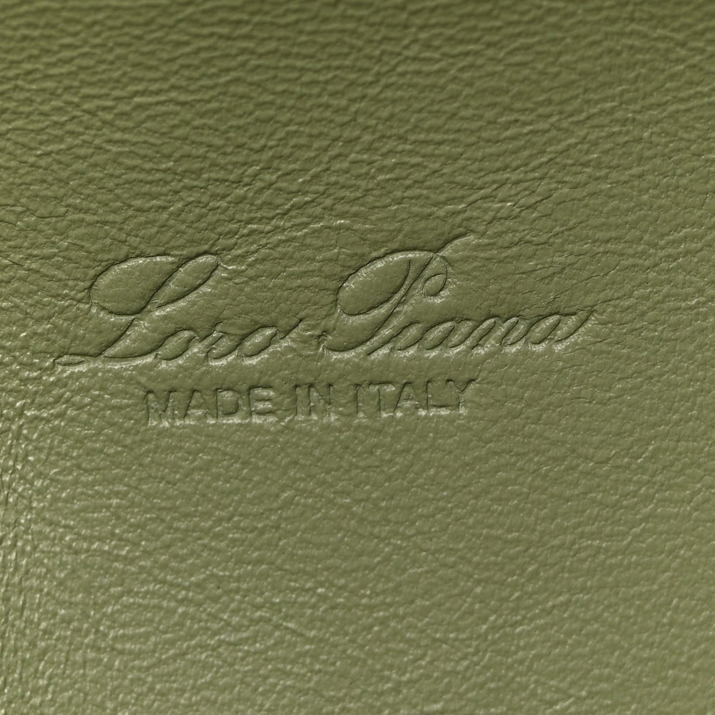 Embossed Loro Piana logo on sage green grained calfskin lining