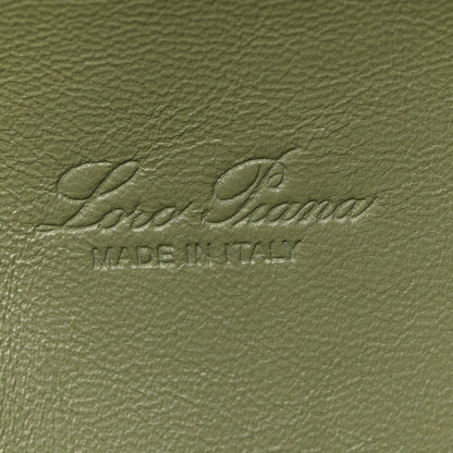 Embossed Loro Piana logo on sage green grained calfskin lining