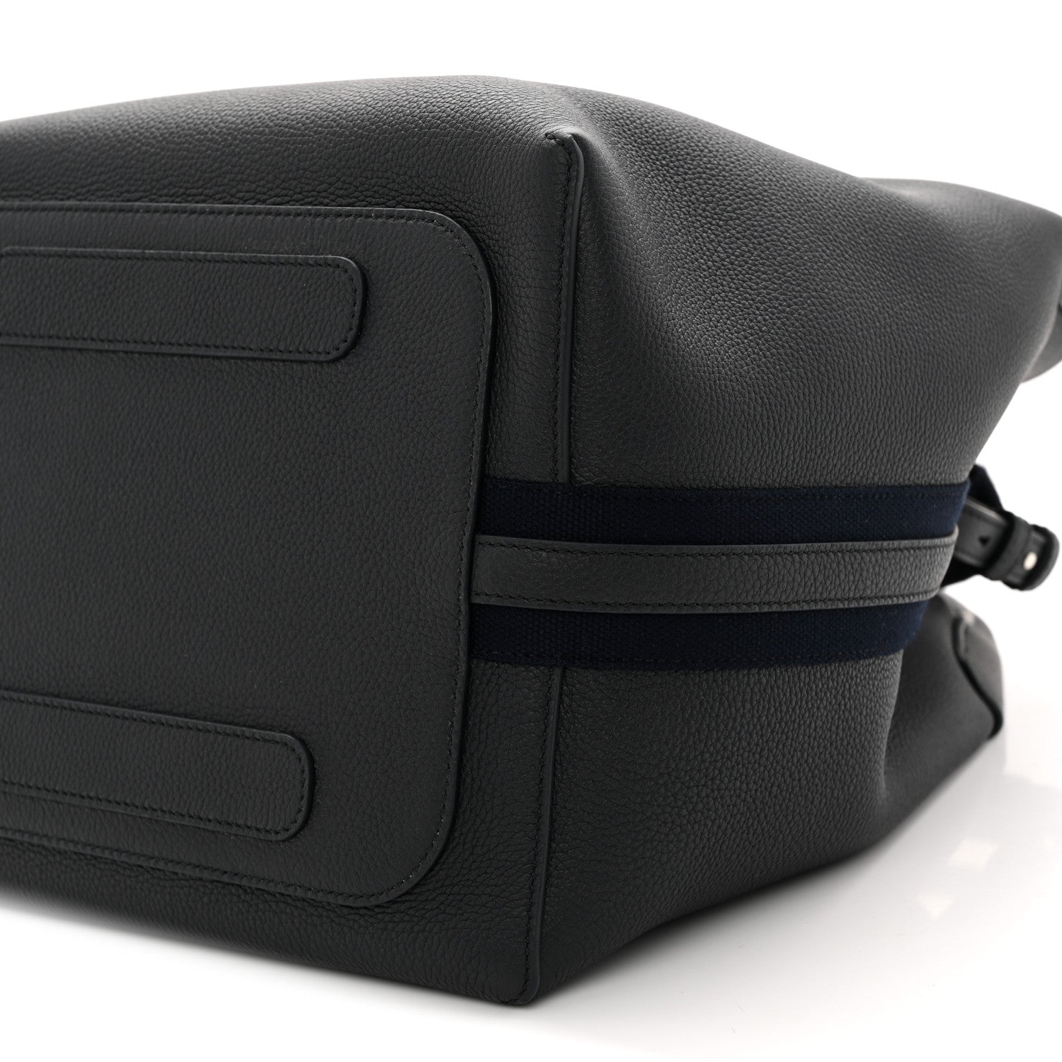 Dark navy leather flap panel with seam details and adjustable crossbody strap