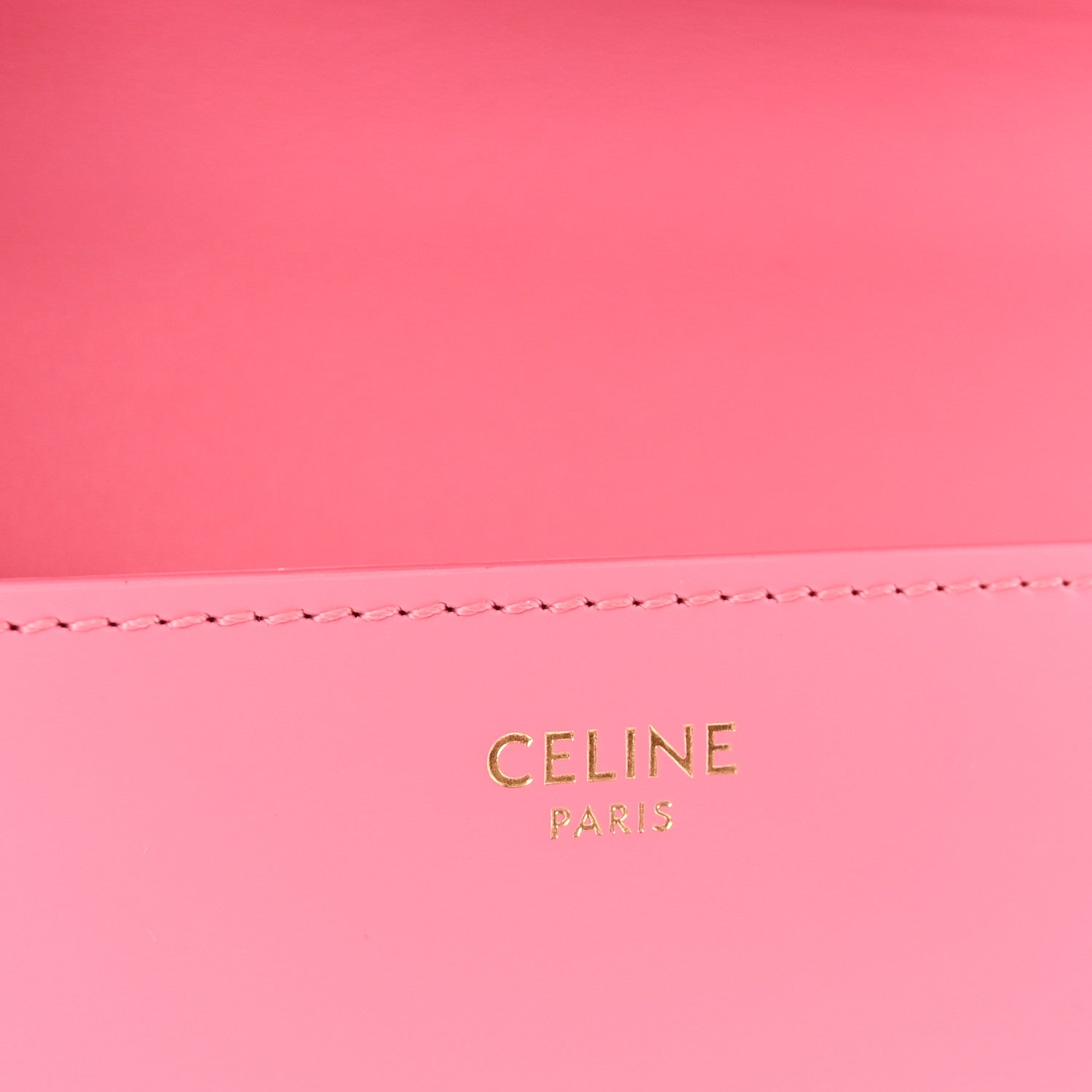Flamingo pink leather back panel with 'CELINE PARIS' gold stamp