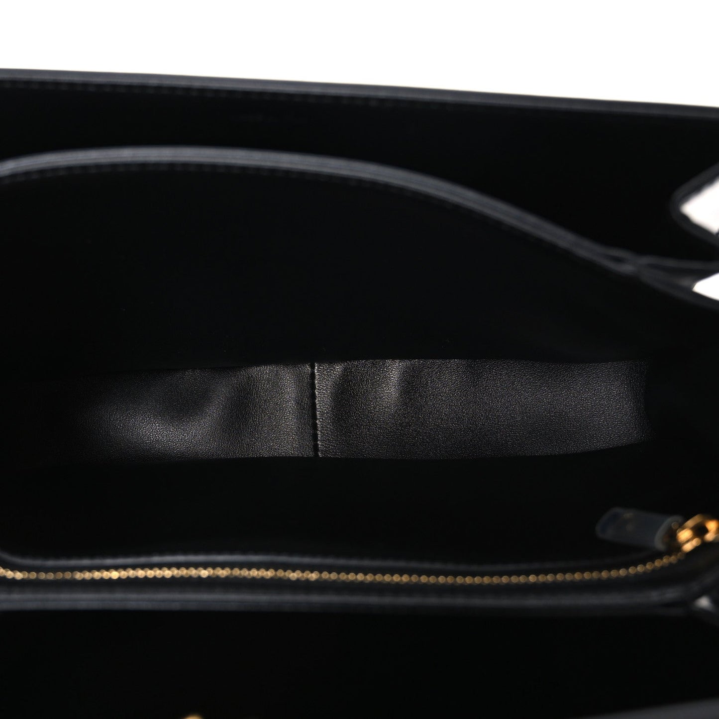 Shiny calfskin medium shoulder bag interior view with black lining and top zipper