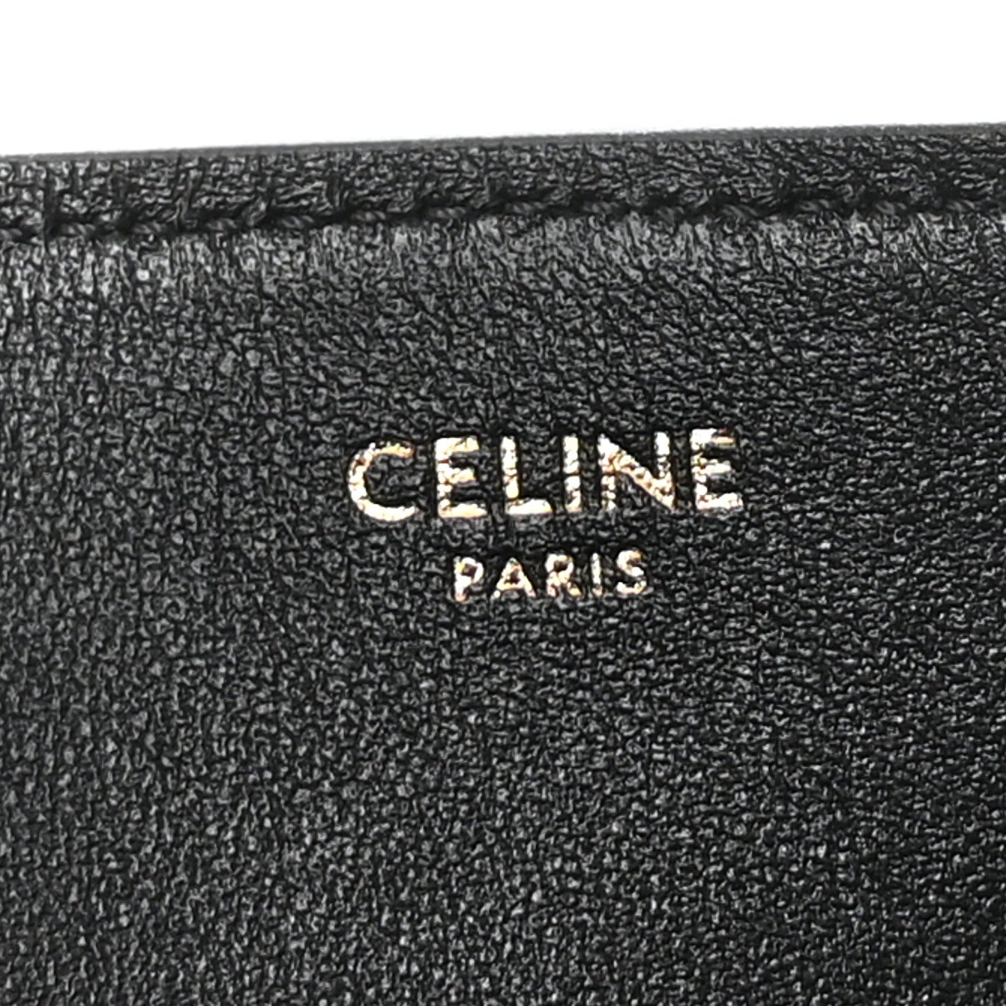 Black leather interior stamp reading “CELINE PARIS”