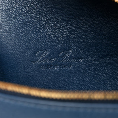 Loro Piana embossed logo on navy grained calfskin with gold zipper trim