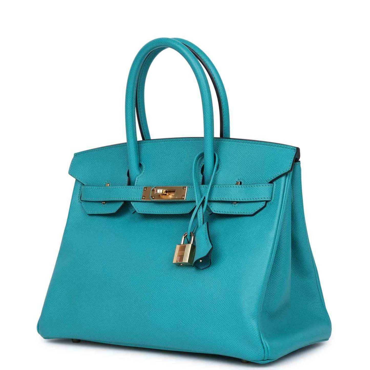 Elegant turquoise leather handbag with gold hardware, featuring a timeless, sophisticated design.