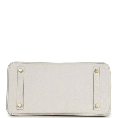 Timeless, elegant white leather handbag base with gold accents and refined stitching.