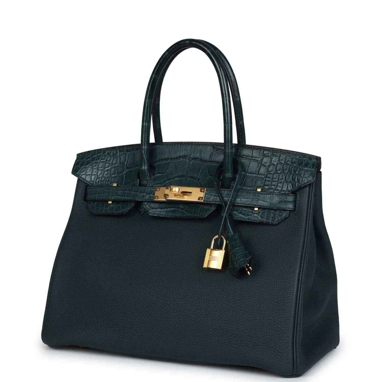 Elegant dark green leather handbag with crocodile texture and gold hardware, timeless style