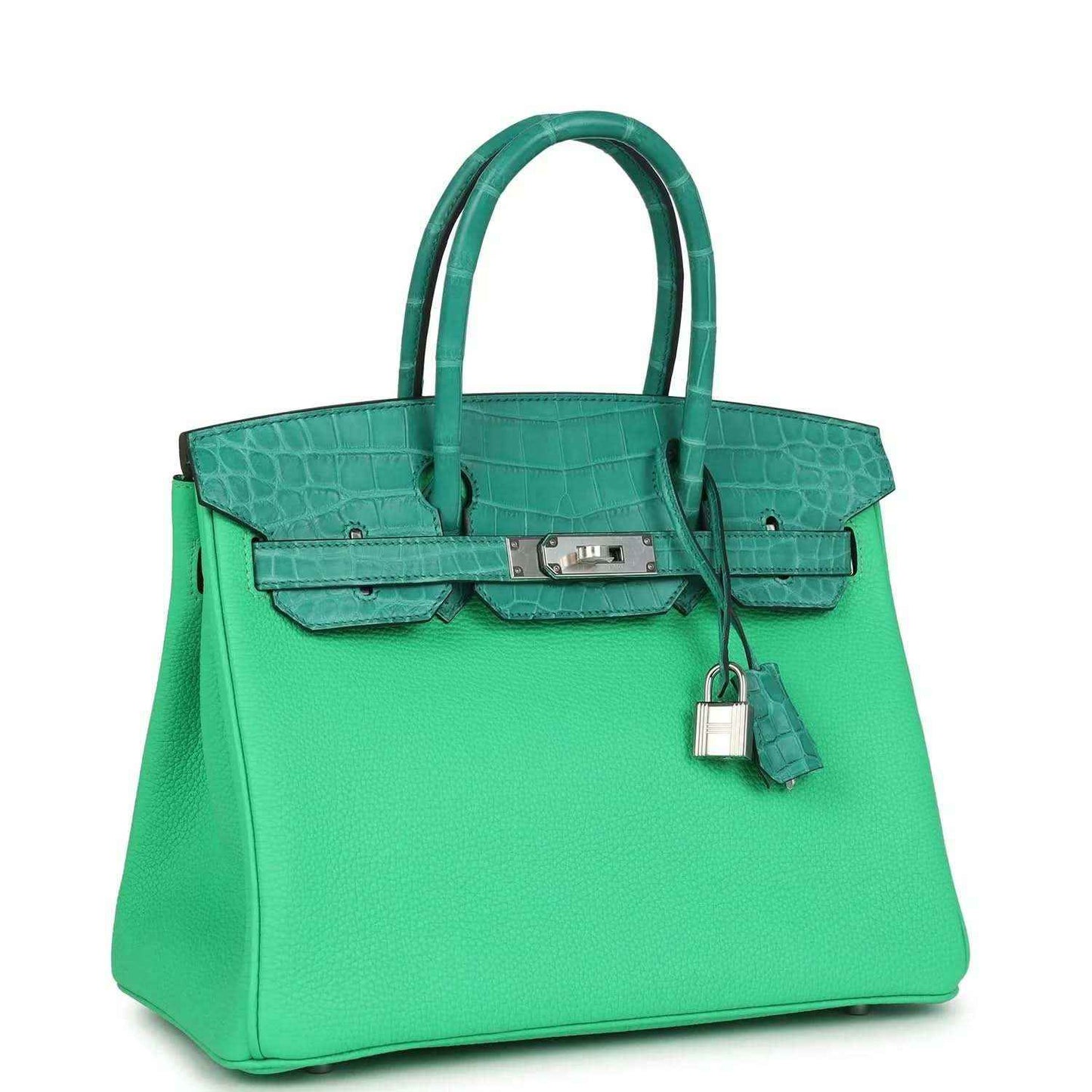 Elegant emerald green leather handbag with crocodile texture and silver hardware