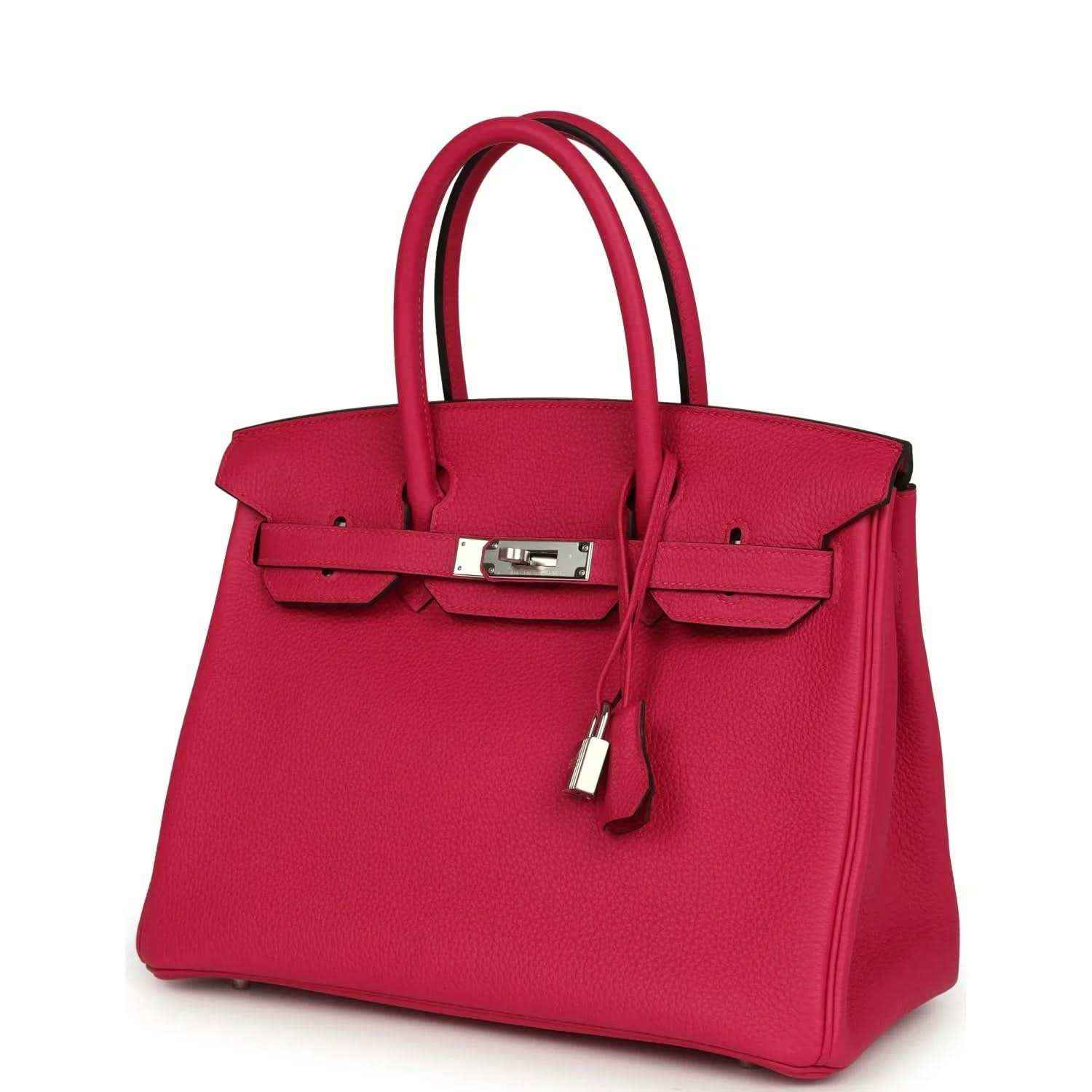 Elegant red leather handbag with silver hardware, timeless and sophisticated design.