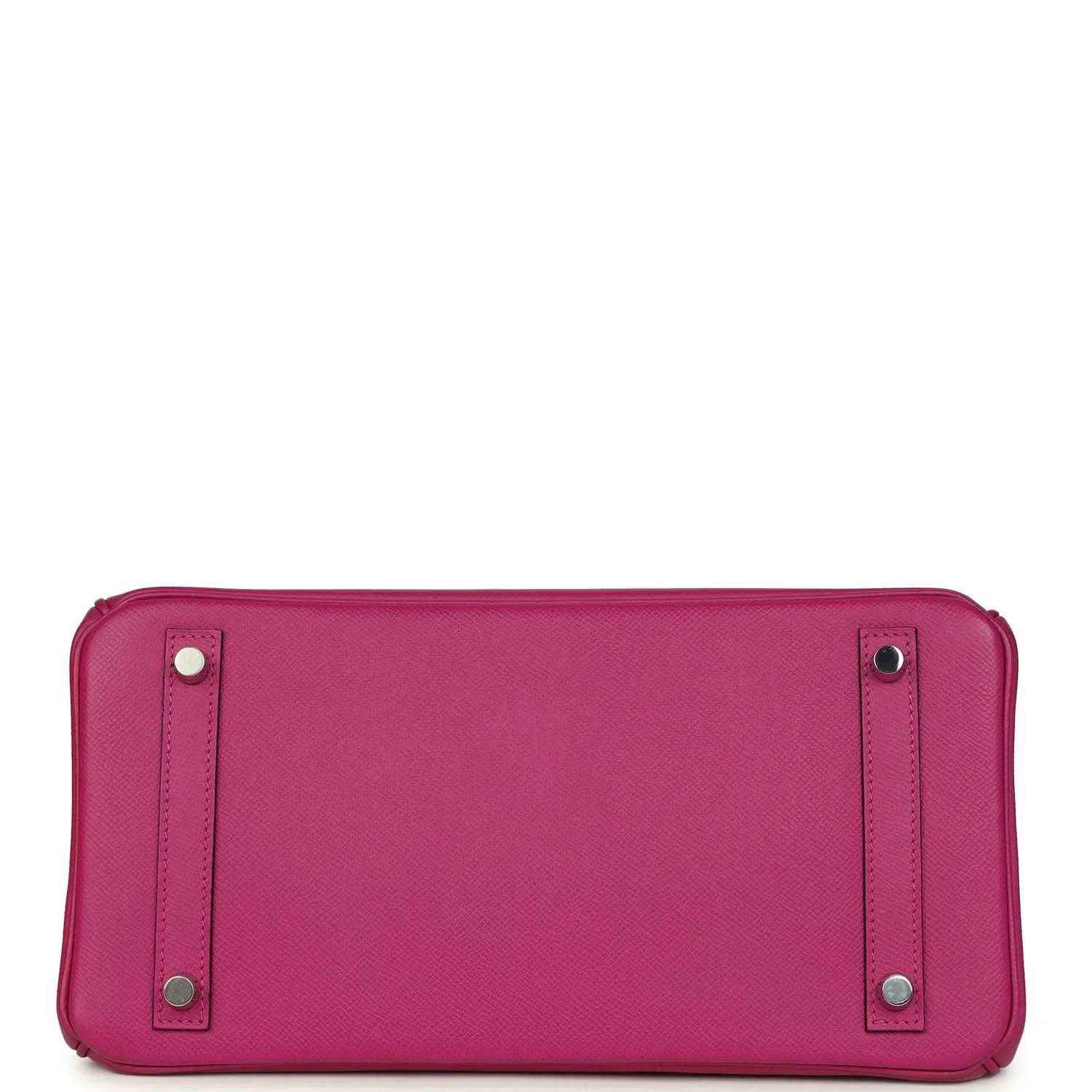 Elegant fuchsia leather handbag base with silver studs, timeless and sophisticated style.