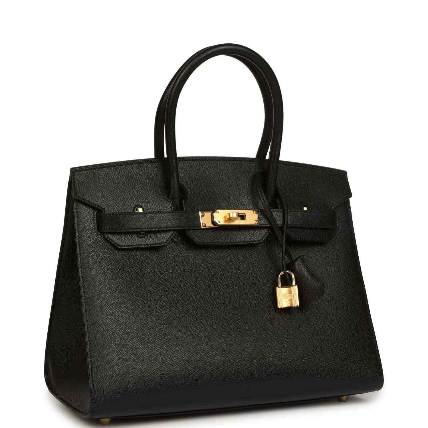 Hermes Birkin handbag in black leather with gold front lock and two handles