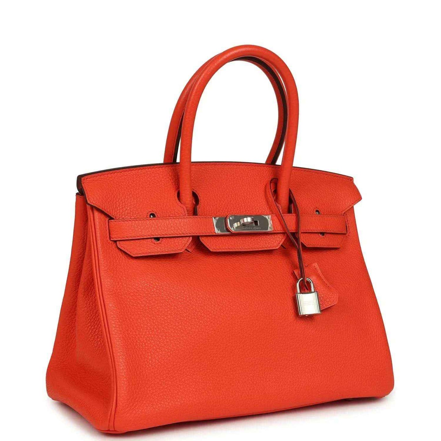 Elegant orange leather handbag with silver hardware, timeless and sophisticated style.