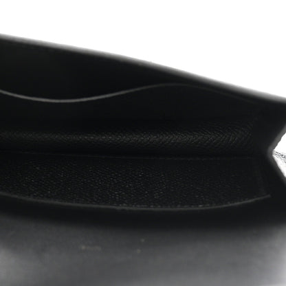 Black leather wallet interior with stitched edge and soft lining.