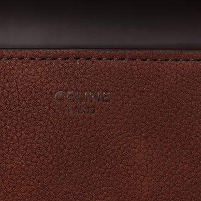 Brown grained leather panel with 'CELINE PARIS' stamp.
