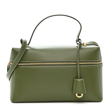 Olive green leather handbag with top handle, shoulder strap, and gold zipper