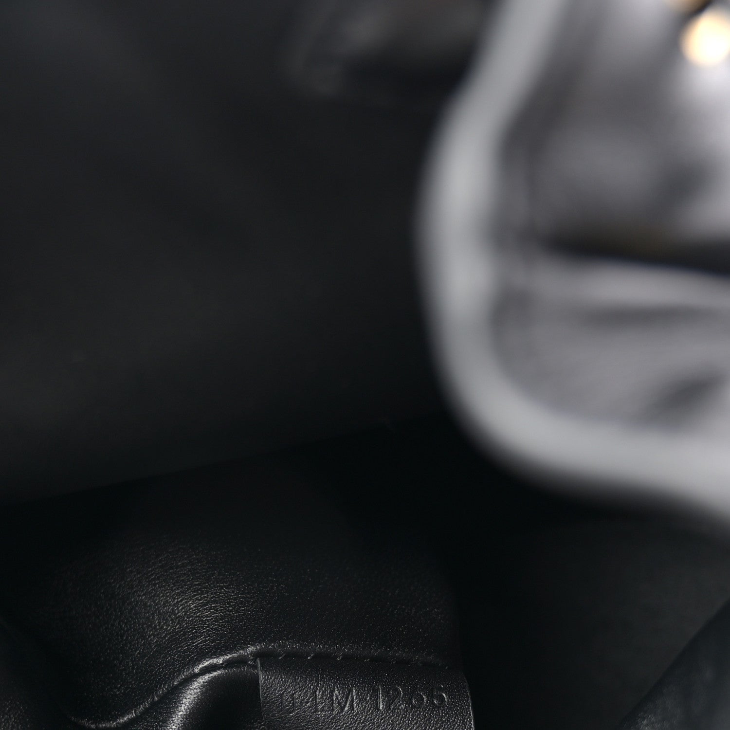 Celine calfskin Bonnie backpack close-up of embossed serial number.